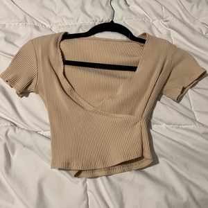 Nude cropped shirt